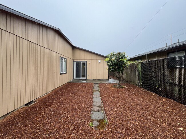 Building Photo - Inviting 2 Bedroom Home with Open Layout, Stainless Steel Appliances & Private Outdoor Retreat