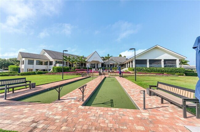 Building Photo - Turnkey 2-bedroom plus den villa, perfectly situated to capture stunning golf course and lake vie...