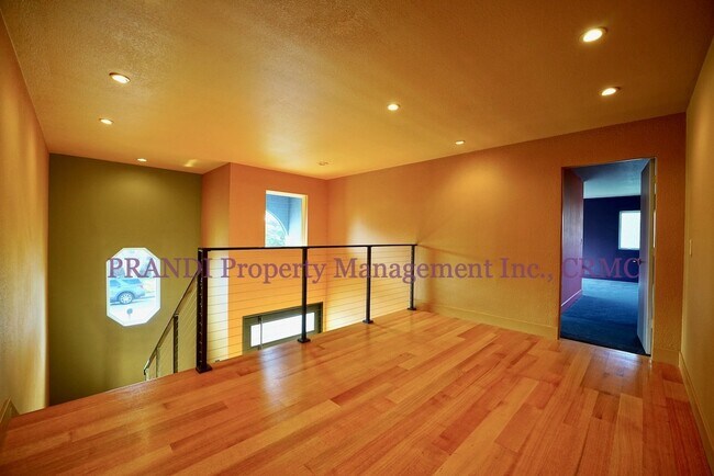 Building Photo - Sleek, Expansive, Designer Home with Priva...