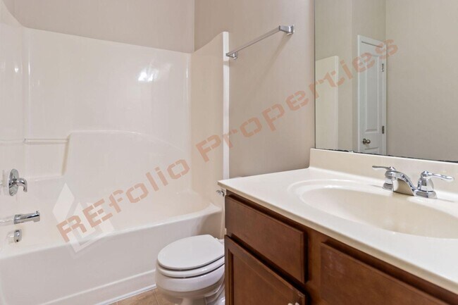 Building Photo - Luxury 3-Story Townhome, No Carpet 4 Bedro...