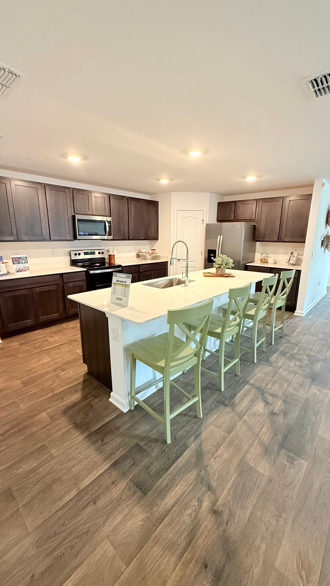 Picture is of model home. The home has white cabinets - 16 Summerwood Rd S