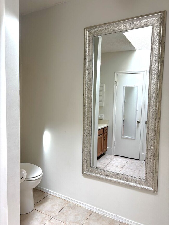 Building Photo - Two bed / Two bath condo off Grelot Road