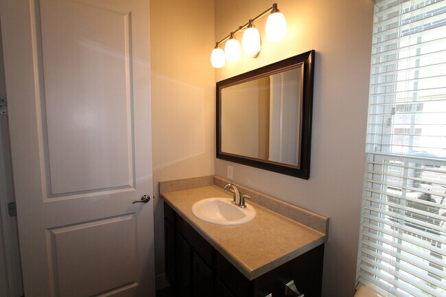 Building Photo - Midtown Renovated Duplex - Hardwood Floors, Exposed Brick