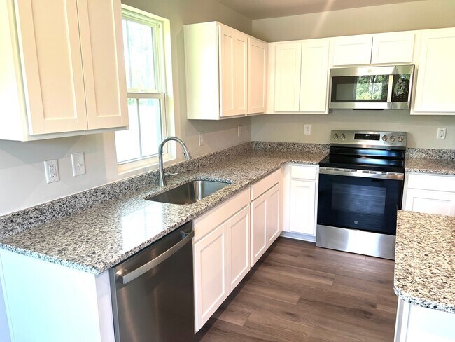 Building Photo - New Three-Bedroom, Two and one-half Bath T...