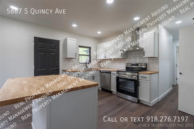 Building Photo - 5667 S Quincy Ave