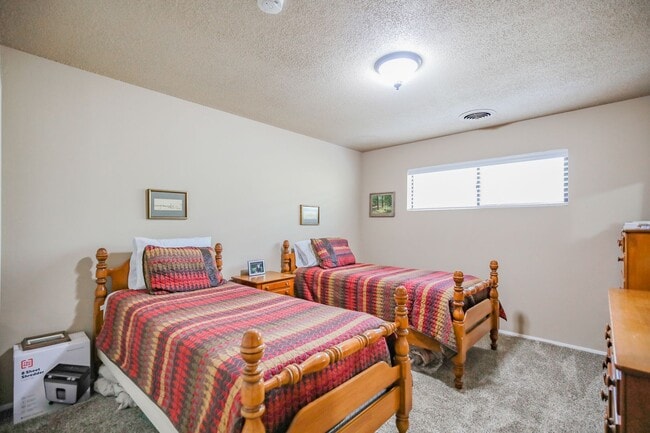 Building Photo - Three Bedroom Home with Plush Backyard