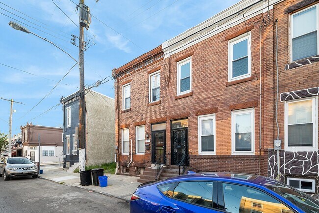 Building Photo - Renovated 4-Bedroom Home with Modern Finishes