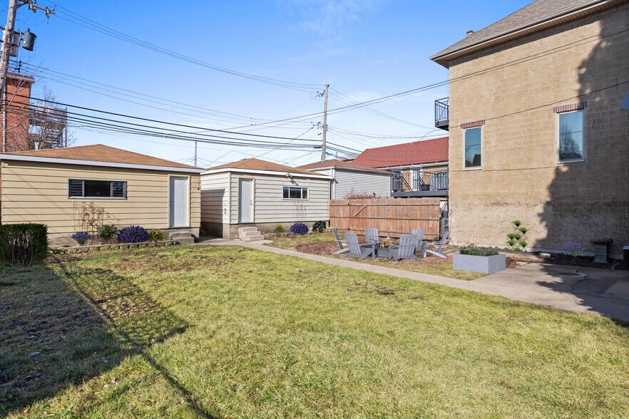 One 2 car garage included! Massive, fenced, double lot, yard! Firepit! Gardens! Dog friendly! - 3214 S Throop St