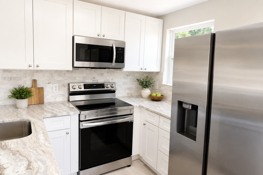 Marble Backsplash with Stainless steel appliances - 504 Engman St