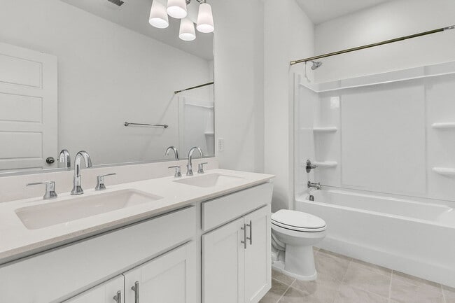 Building Photo - Must See Beautiful 3BR Home in Nexton with Primary Suite Downstairs and a Fenced in Yard & Upstai...