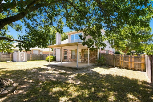 Building Photo - "Spacious Two-Story Home with Multiple Living Spaces and and Expansive Backyard!"