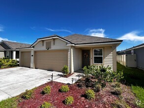 Building Photo - Picturesque Waterfront 4-Bedroom Home with...