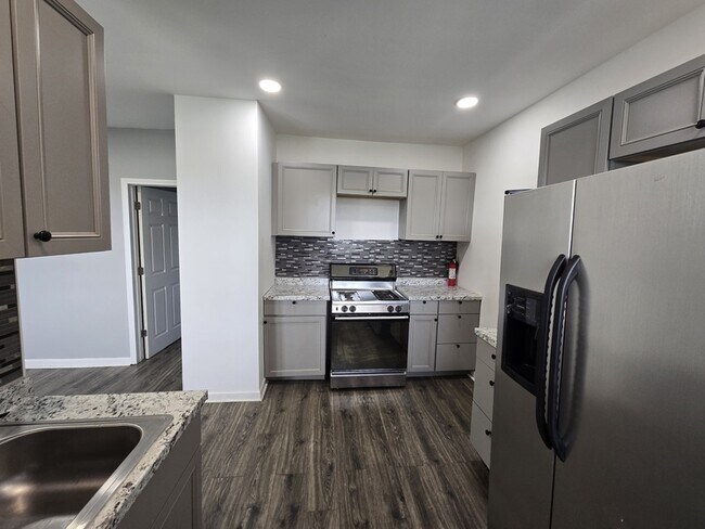 Building Photo - 9340 Moffat Ave