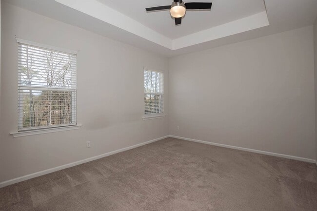 Building Photo - Four Bedroom Townhome!