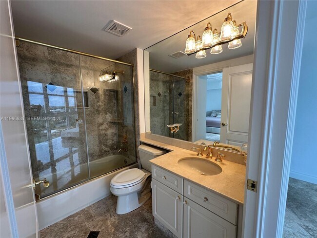 Building Photo - 6051 N Ocean Dr