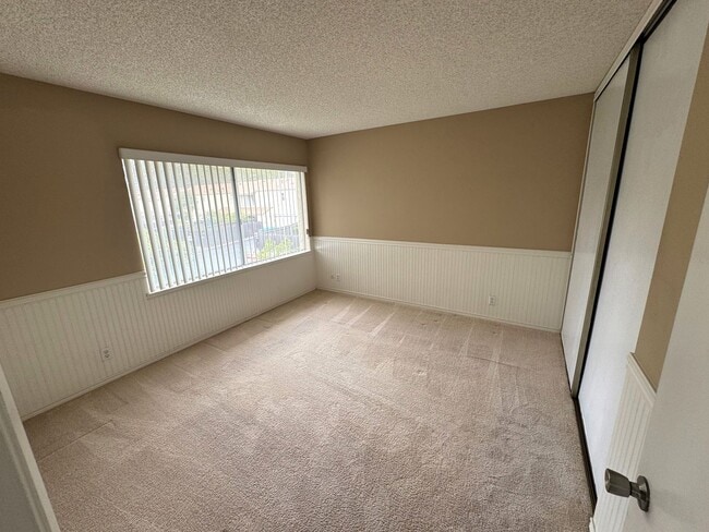 Building Photo - Todd Ranch Townhome- Overlooking The Community Pool!