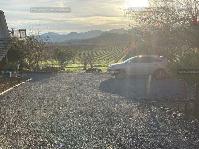 Building Photo - A price and views that can't be beat- Upper Flat with deck & expansive Vineyard and Sunset views