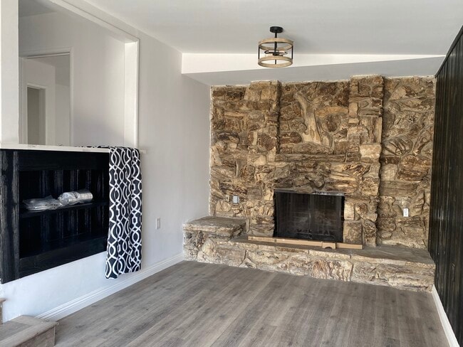 Den with wood burning fireplace - 17423 Burbank Blvd