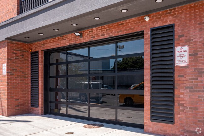 Parking Garage Entrance - Helix Luxury Apartments