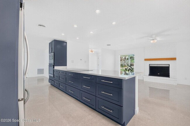 Building Photo - Welcome to this beautifully remodeled 4-bedroom, 3-bath home in the heart of Indialantic Beach!