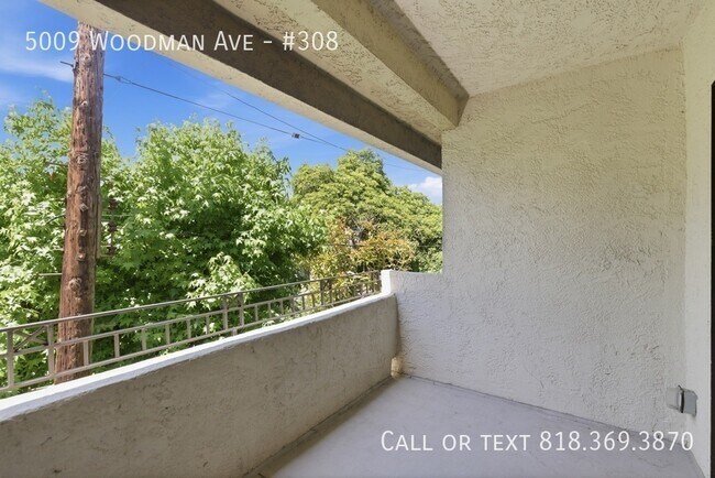 Building Photo - 5009 Woodman Ave