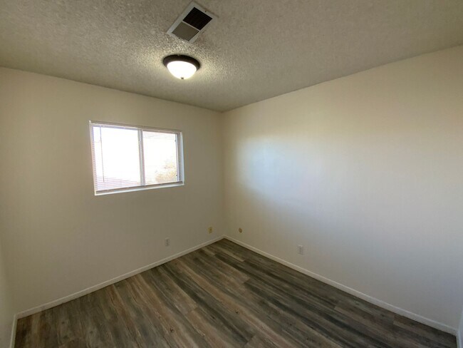 Building Photo - 4 Bedroom Single Story Home Available Near Tramway Blvd NE & Copper Ave NE!