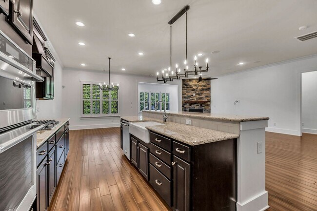 Building Photo - Beautifully maintained and move-in ready, this stunning mostly one-level all-brick home
