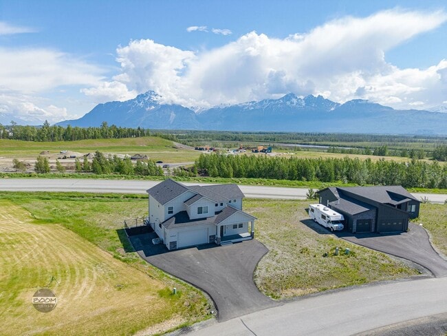 Building Photo - Premium 4BR Rental in The Ranch | Stunning Mountain Views | Easy Community Location | Automatic G...