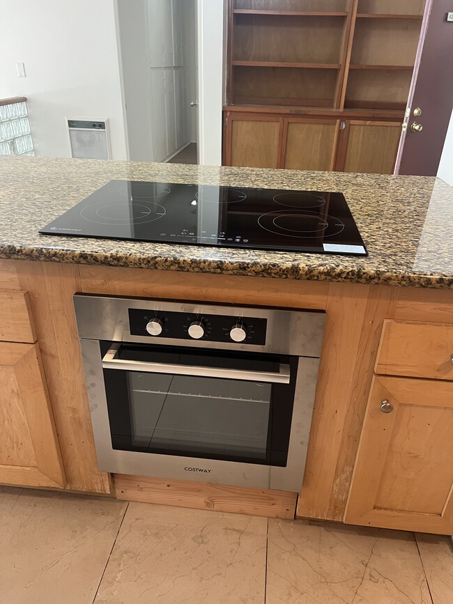 New oven and induction stove top - 6526 Ocean Crest Dr