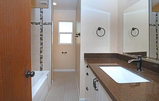 Building Photo - Charming Sam Hughes Brick Home with large ...