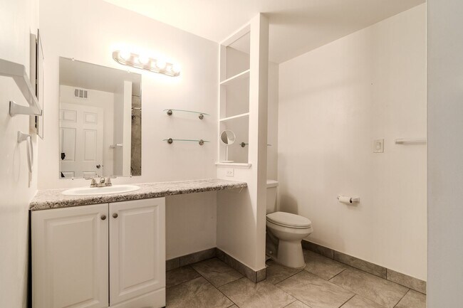 Building Photo - Move-In Ready Fox Hills Condo with In-Unit Laundry & Assigned Carport