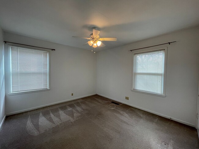 Building Photo - Your New Snyder Sanctuary: Modern Updates, Massive Storage & a Cozy Porch
