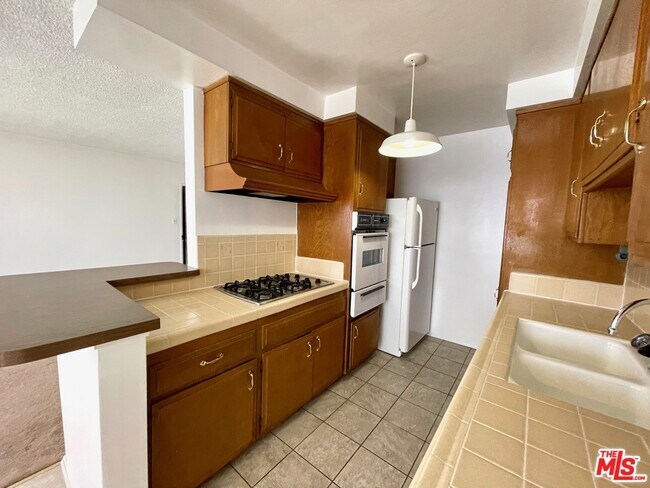 Building Photo - 11727 Mayfield Ave
