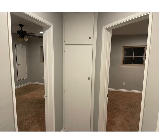 Hallway with bedroom entrances - 11963 Truro Ave