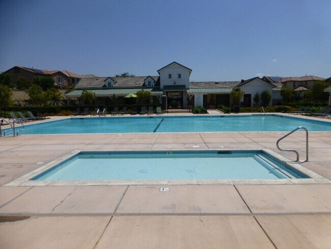 Building Photo - Short Term Lease - Grand 4-Bedroom Home with Entertainer's Yard in Gated River Village!