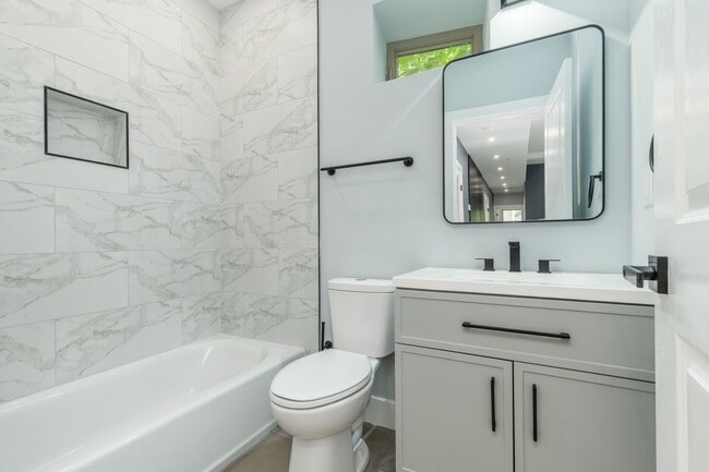 Building Photo - New 2 Bedroom Apartment in Modern Building! Now Offering 1 Month FREE on a 12 month lease!