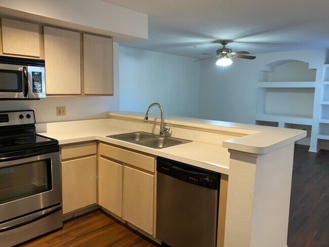Building Photo - Stylish 2 Bed, 2 Bath Condo with New Vinyl Plank Flooring | Live the Resort Lifestyle at Bermuda ...