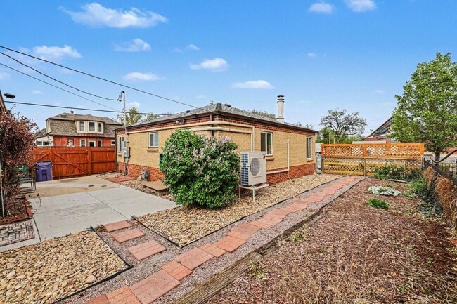 Building Photo - Platte Park Charmer with Sunny Spaces, Cool AC & a Private Backyard Retreat