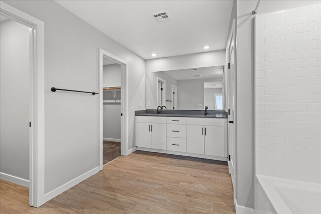 Building Photo - Beautiful and Highly Upgraded Townhome!