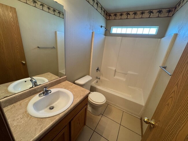 Building Photo - 2 bedroom 2 bathroom duplex with yard care...