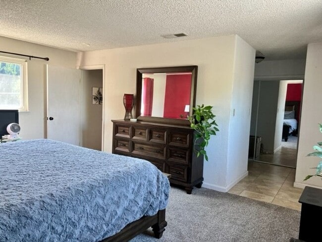Building Photo - Available Now  4 Bedroom 2 bath home