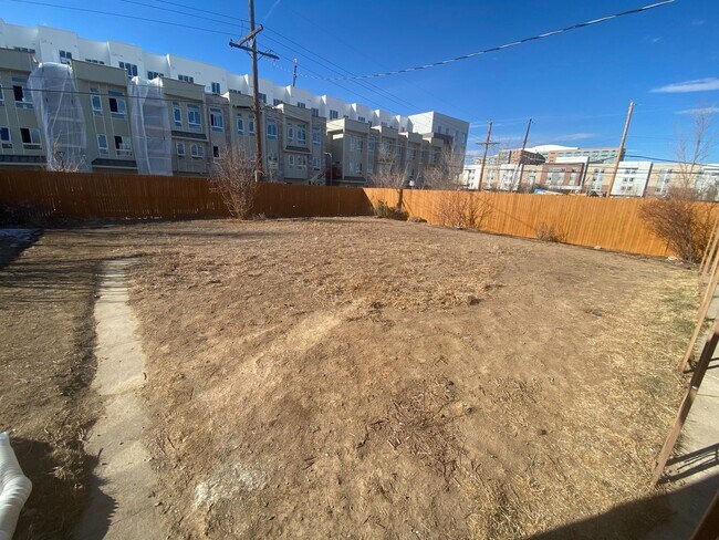 Building Photo - Four bedroom, two bathroom lovely brick ho...
