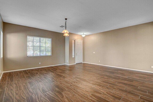 Building Photo - Gorgeous NW Single Story! 3 Car Garage! Serene Backyard.