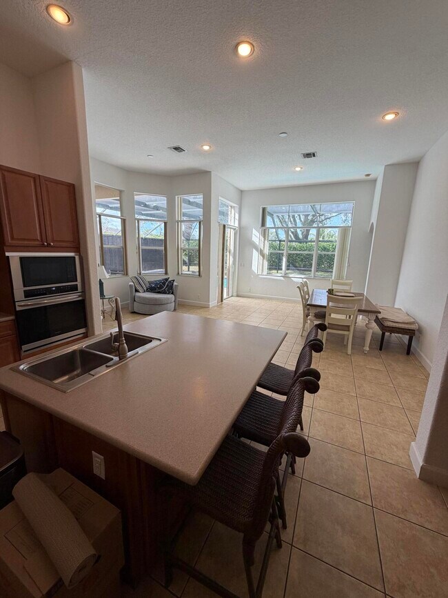 Building Photo - 10440 Cypress Lakes Preserve Dr