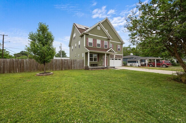 Building Photo - Spacious 6-Bedroom Home with Private Backy...