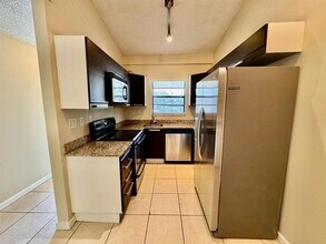 Building Photo - 11211 Royal Palm Blvd