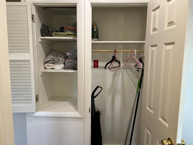 Hallway utility and linen closet - 100 Manning Pl