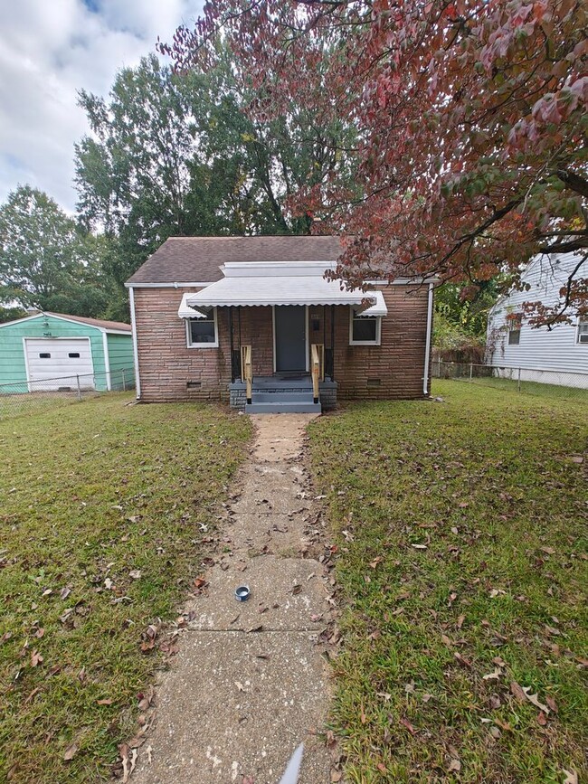 Primary Photo - 2 bedroom home with fenced in rear yard