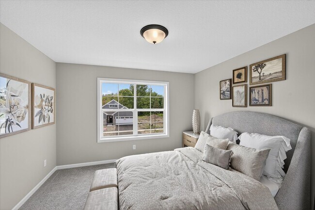 Building Photo - Westview townhome plan in Corcoran’s Hope Meadows community—a brand-new townhome development near...