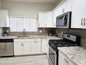 Building Photo - 8901 E Garden Dr